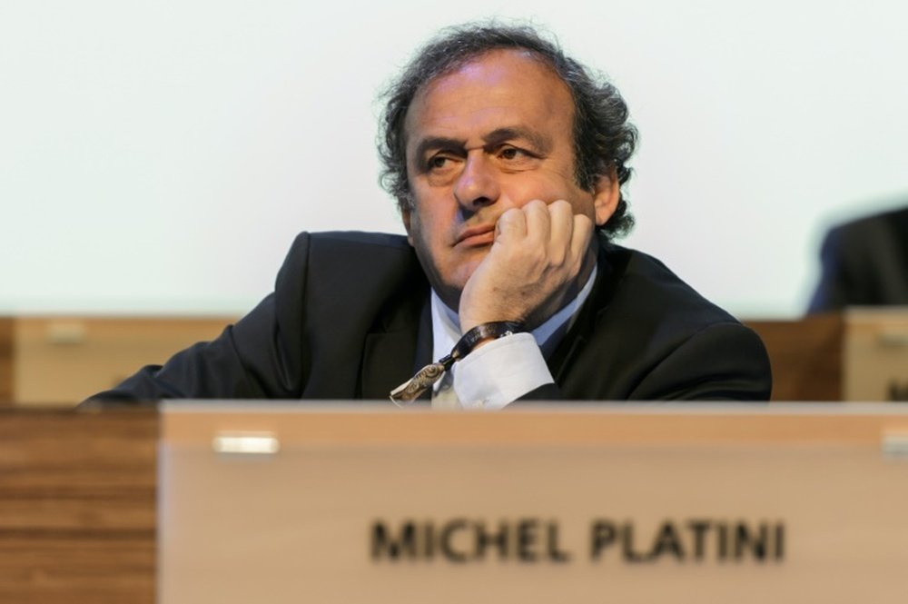 Michel Platini, pictured on June 11, 2014, is suspended for 90 days after Swiss investigators said the UEFA chief had received a disloyal payment of two million Swiss francs ($2.04 million, 1.8 million euros) from FIFA president Sepp Blatter
