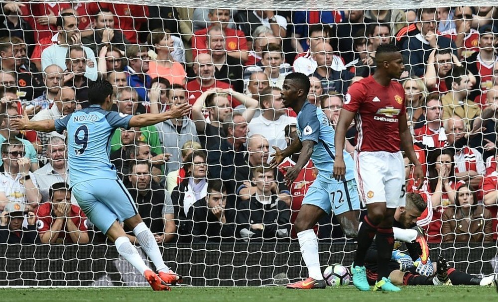 Manchester Citys striker Kelechi Iheanacho (2nd L) celebrates after scoring their second goal during the English Premier League football match against Manchester United on September 10, 2016