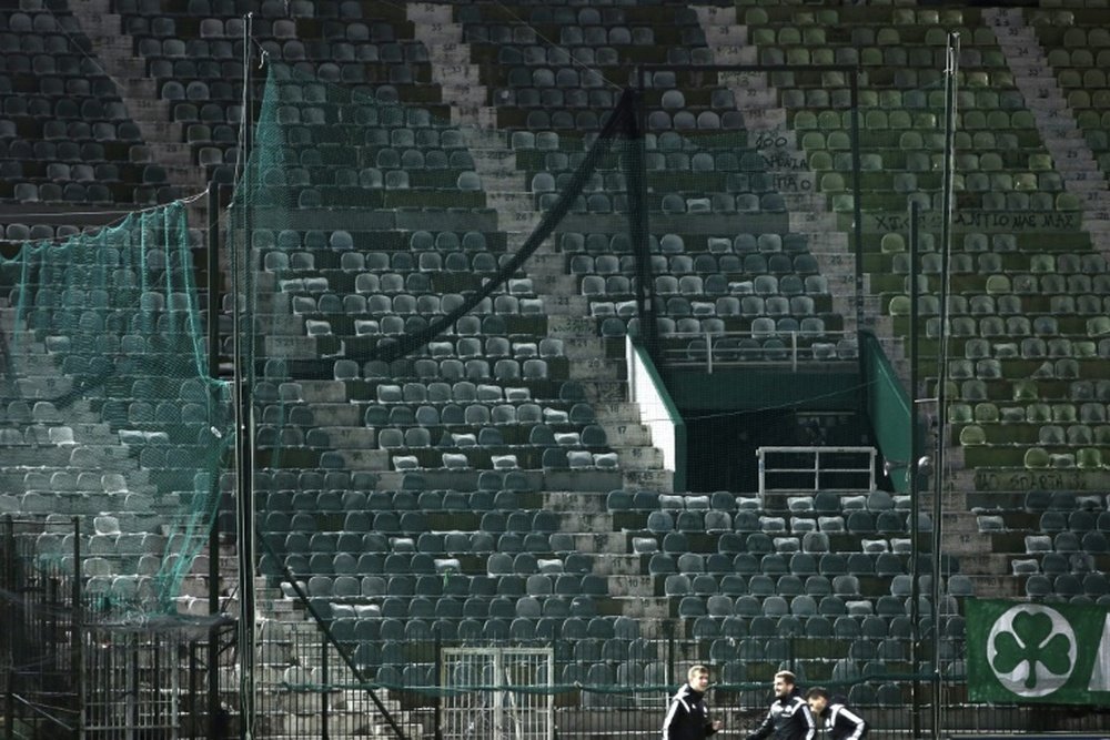 Stands of the Apostolos Nikolaidis Stadium in Athens are seen empty before a football match on March 8, 2015, after a decision to play the match behind closed doors due to crowd violence