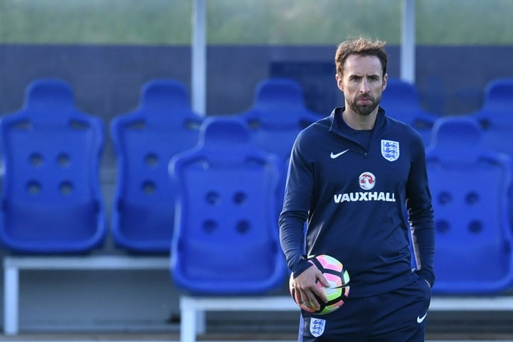 England caretaker manager Gareth Southgate takes a training session at St Georges Park. AFP