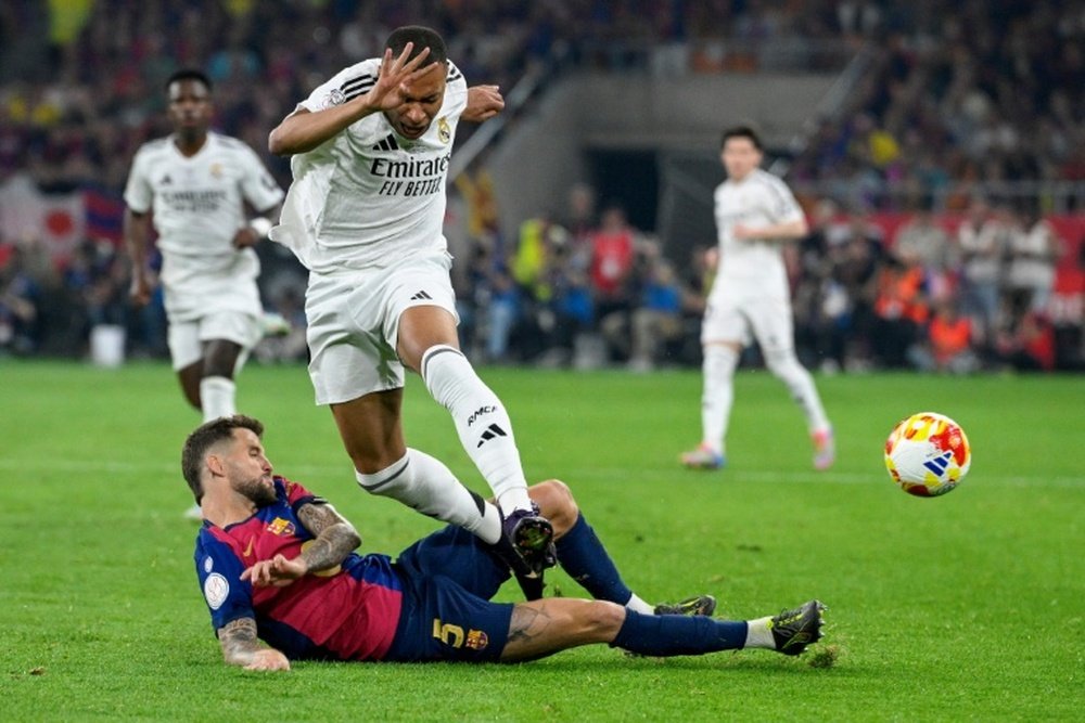 Real Madrid are fighting to stay in the title race behind Barca. AFP