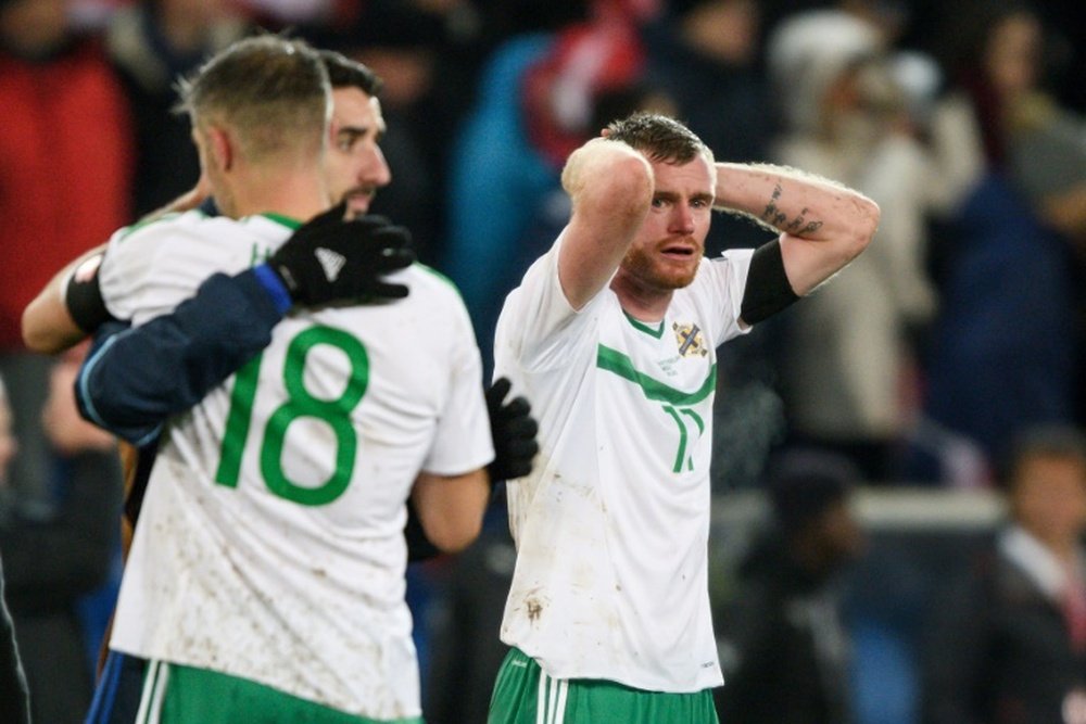 Northern Ireland missed out on a place at the World Cup due to a controversial penalty decision. AFP