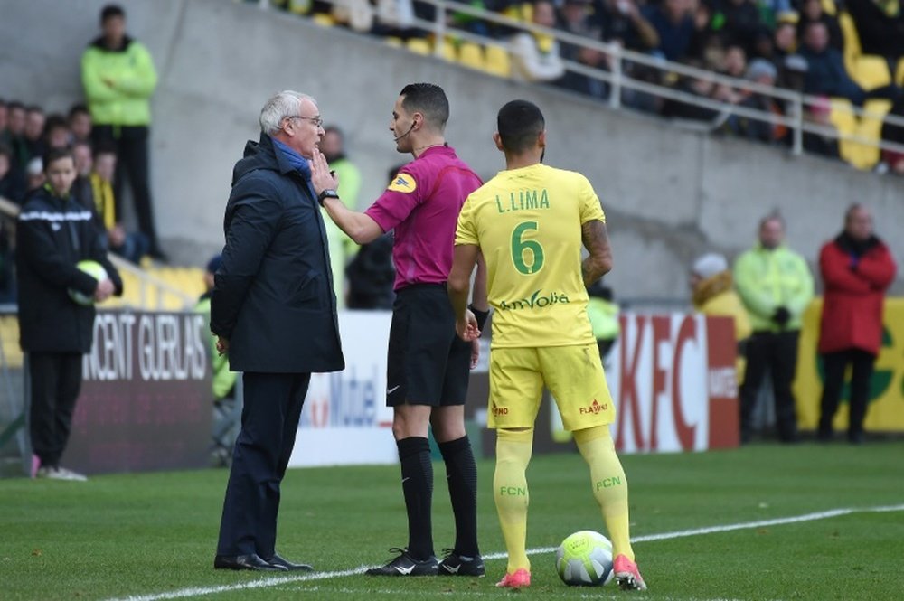 Ranieri apologises after manhandling official. AFP