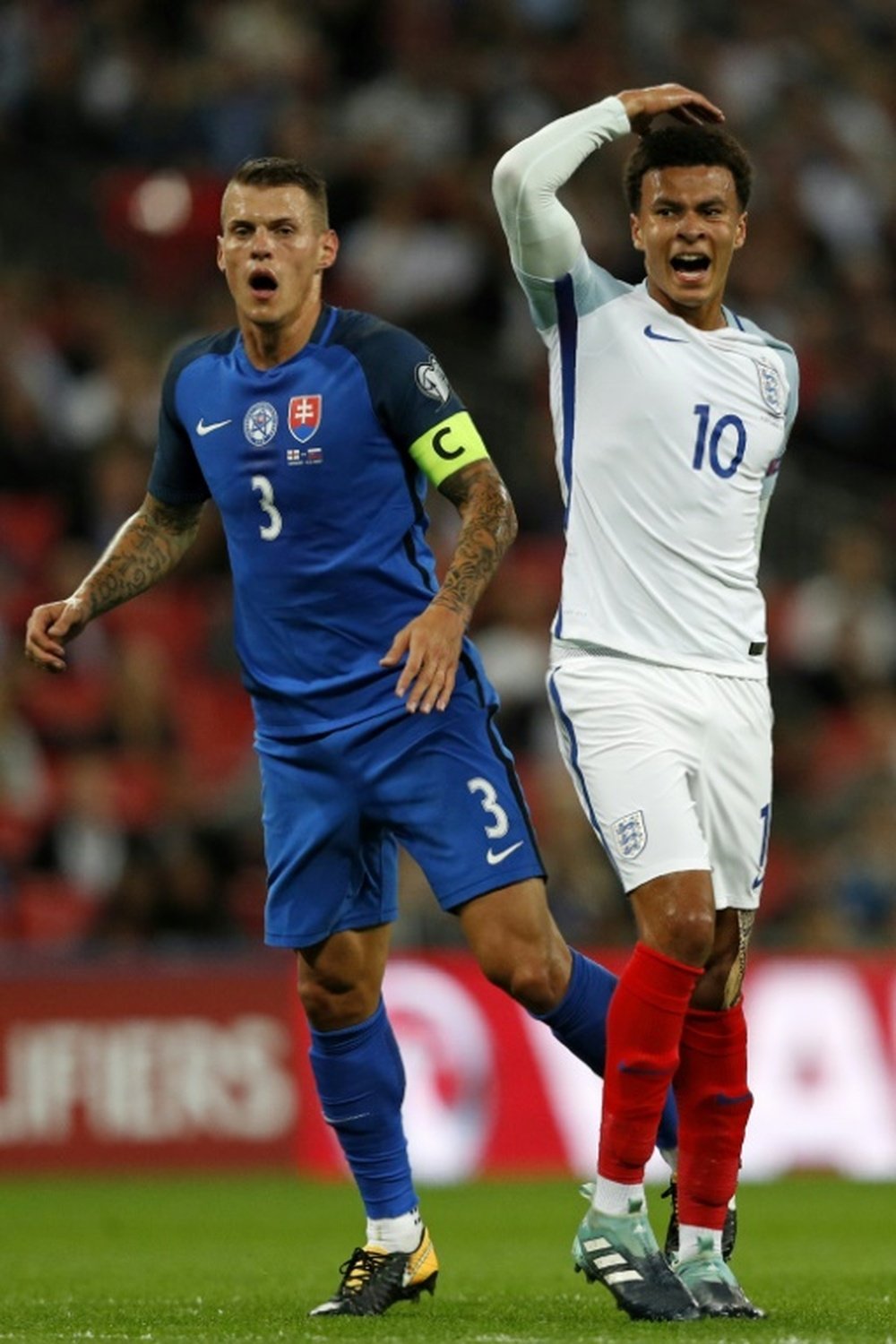 Alli reacts to a missed chance against Slovakia. AFP