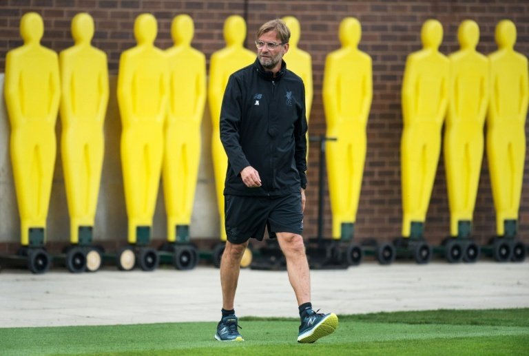 Klopp happy with Wenger's stay