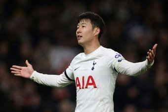 Son wants Tottenham to fight until the end for the Champions League. AFP