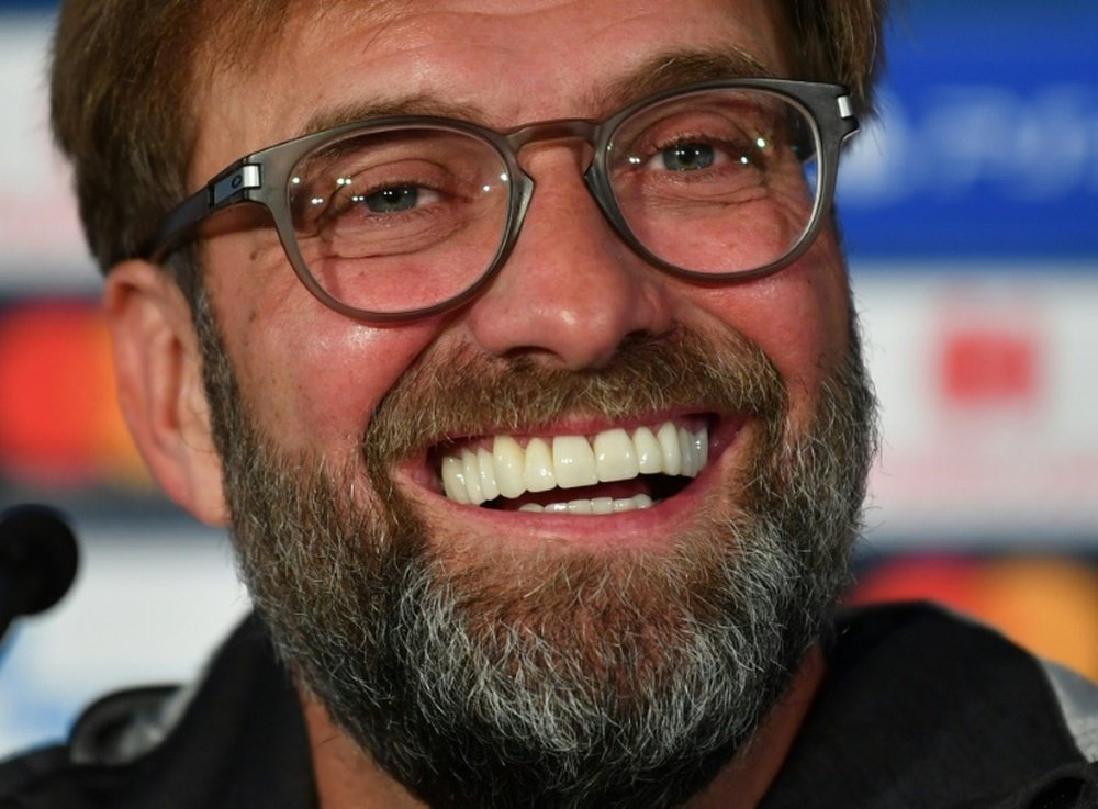 Klopp will stay on at Anfield. AFP