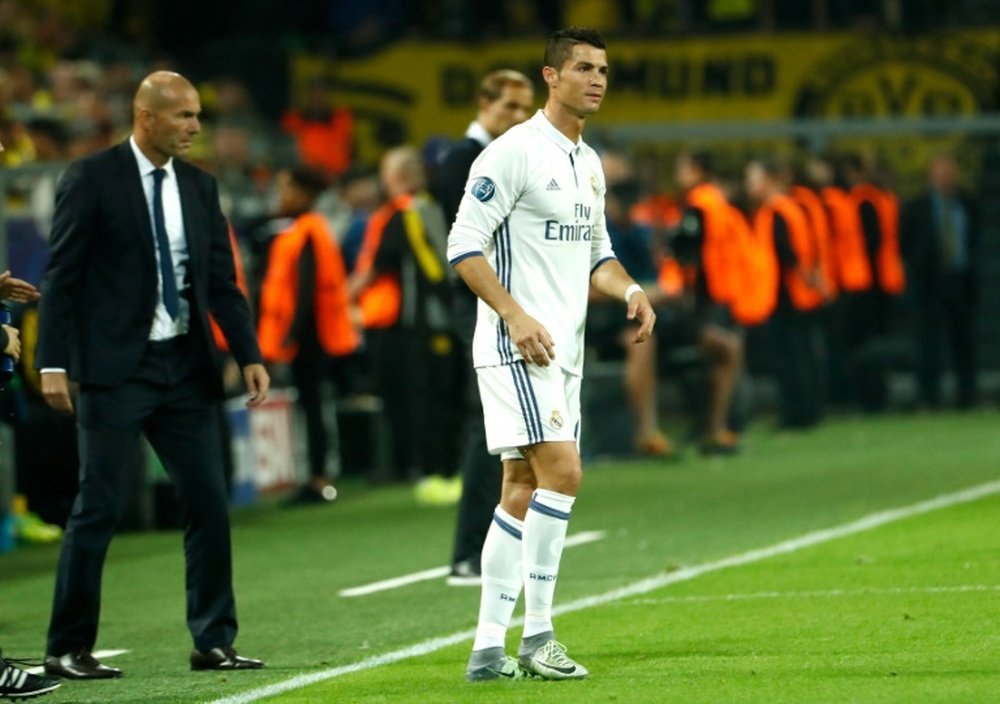 Le coach du Real Madrid, Zidane et Cristiano Ronaldo, lors d'un match de Ligue des champions. AFP