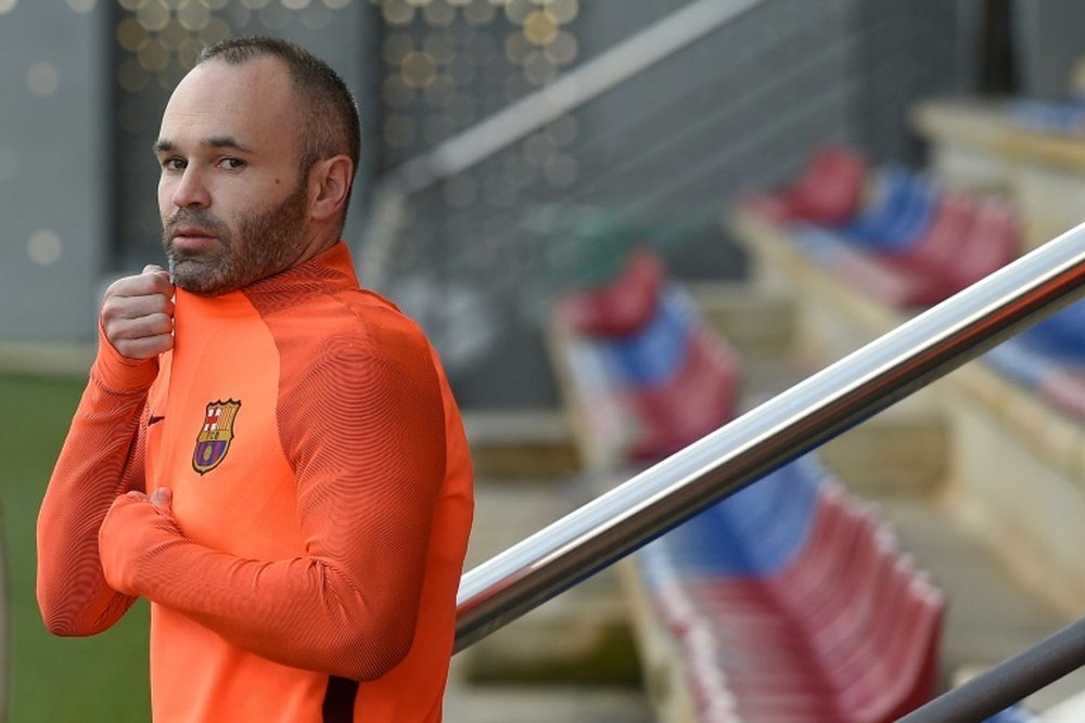 Iniesta has been offered a bumper contract that he will find it hard to refuse. AFP