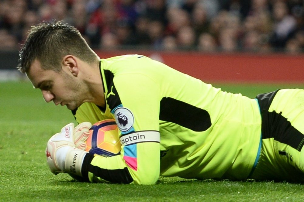 Heaton was forced off during the first half of Burnley's match against Palace. AFP