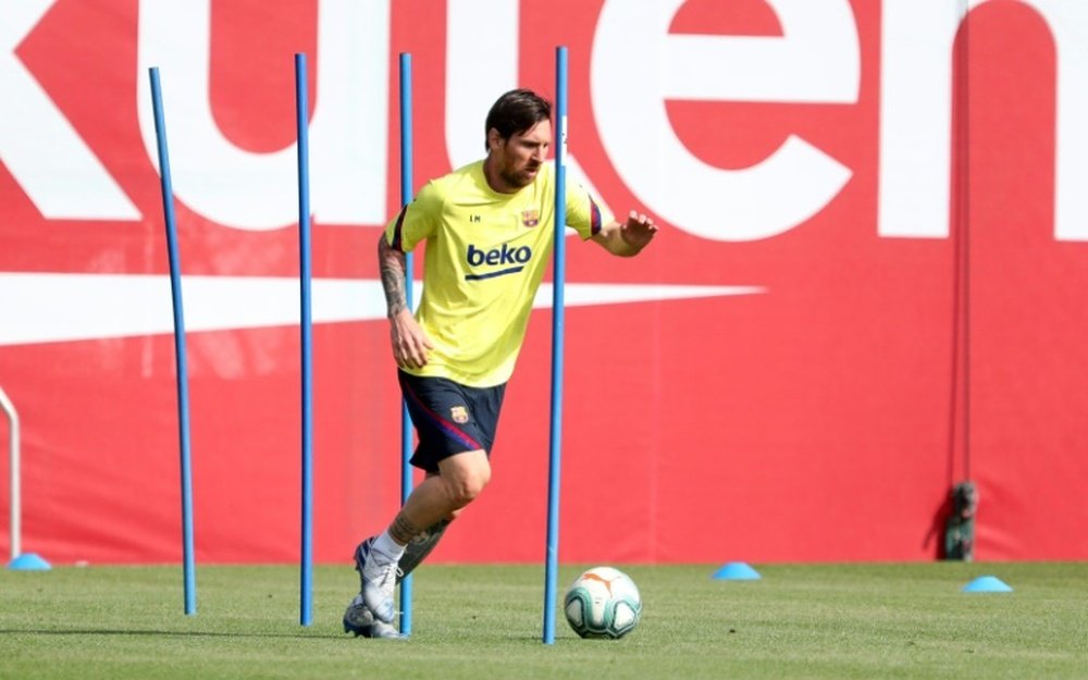 O objetivo é que o Barcelona atinja 50% da condição física no final da semana. AFP