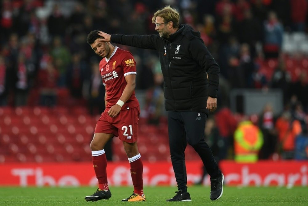 Klopp says that the 'Ox' can still improve as a player. AFP