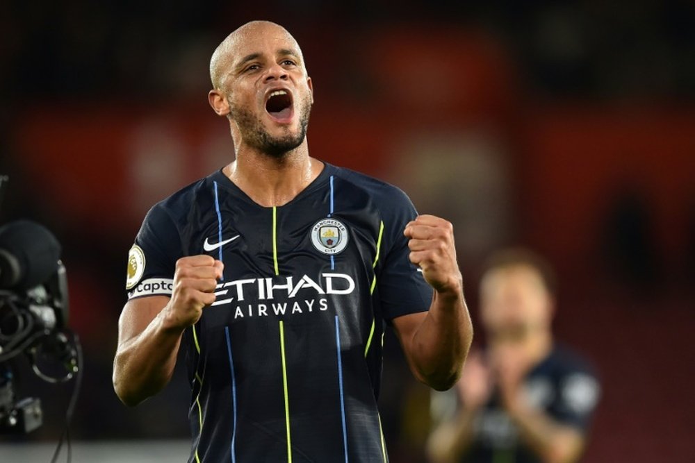 Manchester City captain Vincent Kompany to extend his stay. AFP