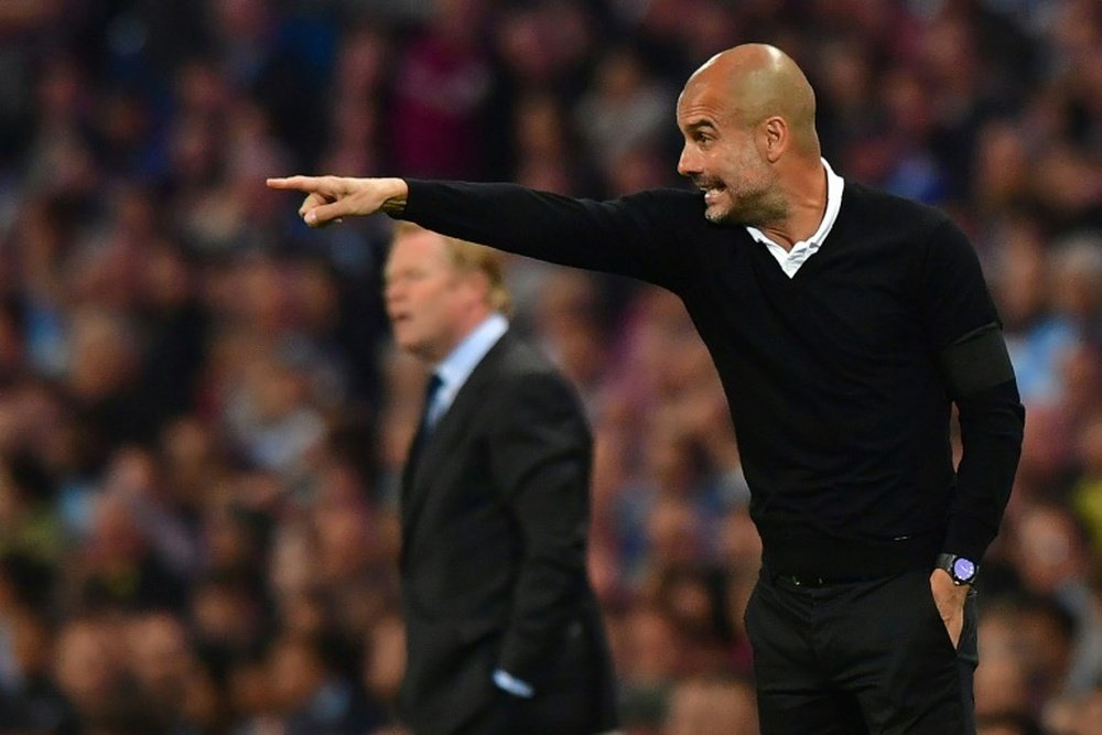 Guardiola is happy with his side's positive start to the season. AFP