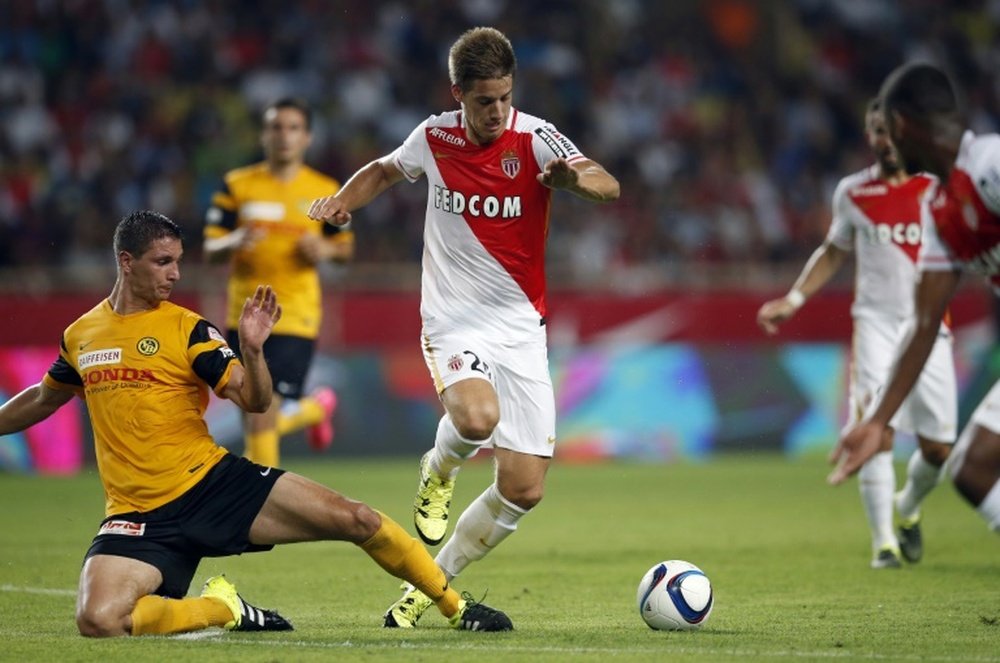 Monaco's Croatian midfielder Mario Pasalic (R) vies with Young Boys' Czech defender Jan Lecjaks (L) during the UEFA Champions League third qualifying round second leg football match on August 4, 2015 at the Louis II Stadium in Monaco
