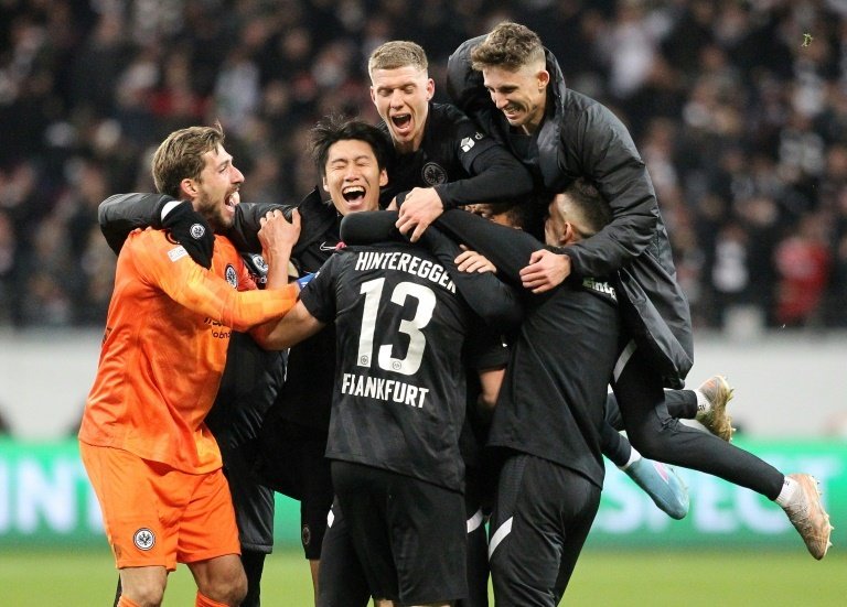 Eintracht Frankfurt players celebrate during their stunning win.AFP