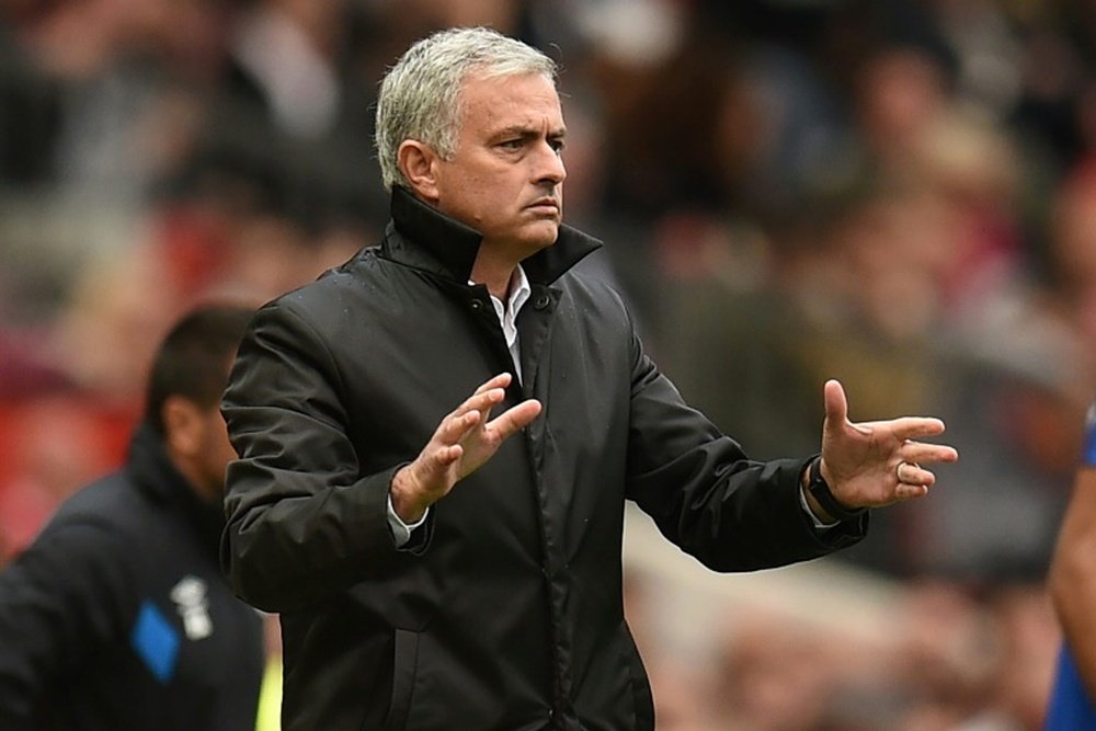 Crooks has labelled Mourinho a coward. AFP