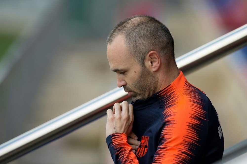 Iniesta will leave Barcelona at the end of the season. AFP