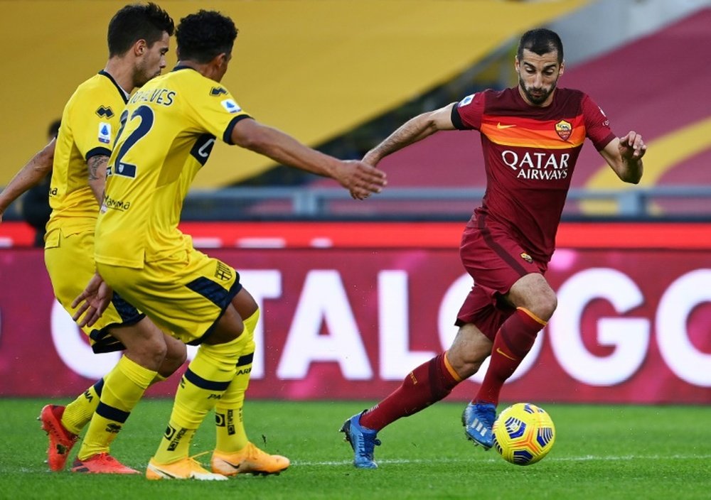 Roma want to keep in form Henrikh Mkhitaryan (R). AFP