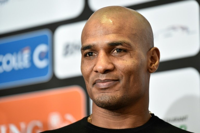 Malouda was banned for previously having played with France. AFP
