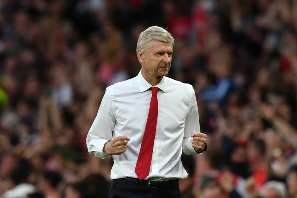 Wenger insists he is relaxed about expiring contracts. AFP