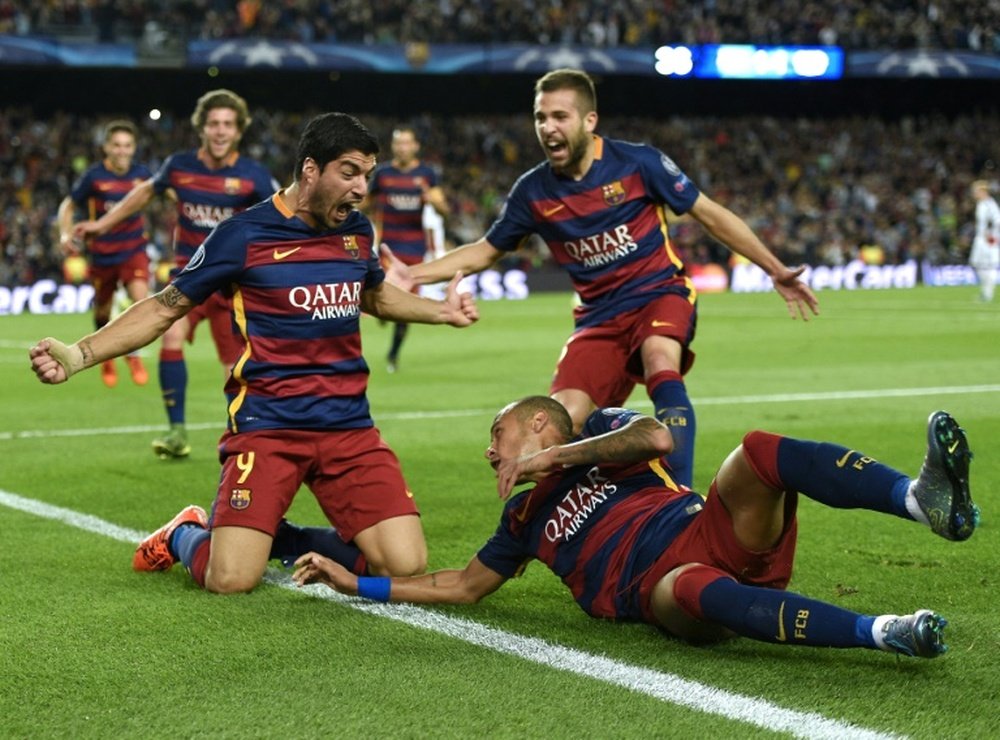 Barcelonas Luis Suarez (C-L) celebrates scoring a goal with teammates, during their UEFA Champions League Group E match against Bayer Leverkusen, at the Camp Nou stadium in Barcelona, on September 29, 2015