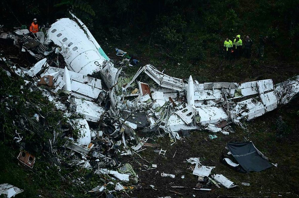 The wreckage of the LaMia airlines charter plane carrying members of the Chapecoense Real football team is seen after it crashed in the mountains of Cerro Gordo, municipality of La Union, on November 29, 2016