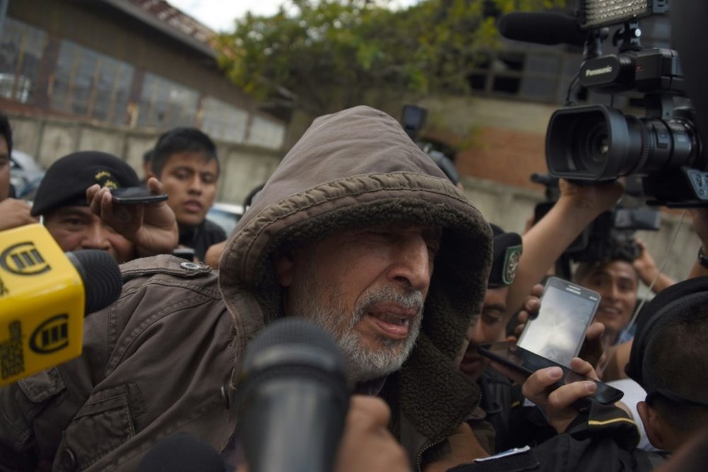 Guatemalan Football Federation former president Brayan Jimenez speaks to the press after being arrested in Guatemala City on January 12, 2016