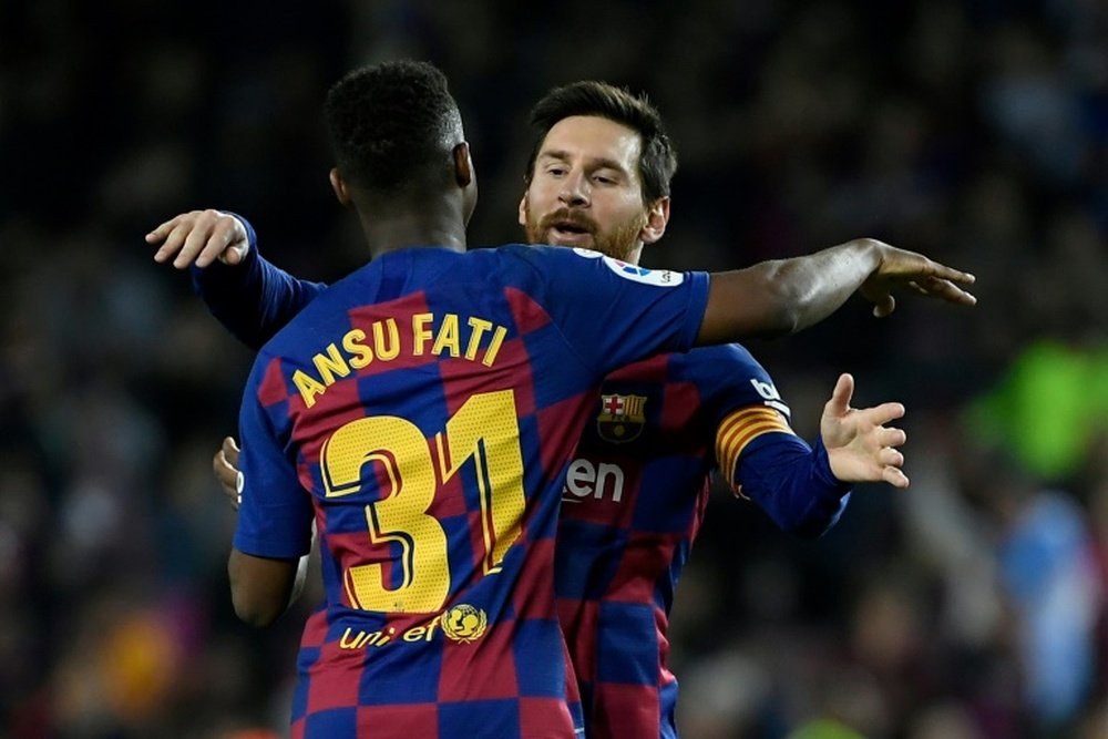 Ansu Fati e Lionel Messi são dois dos quatro inegociáveis no Barcelona. AFP