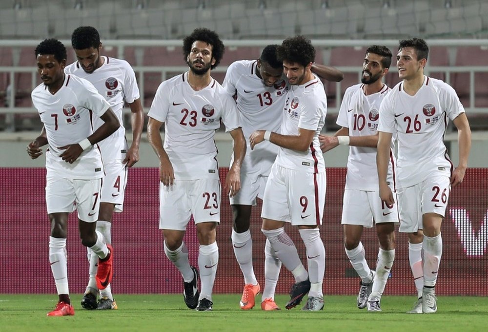 Qatar snatched a draw from the jaws of defeat. AFP