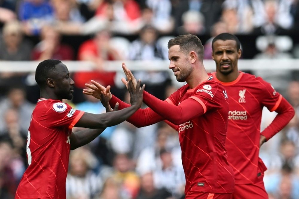 Keita et Oxlade-Chamberlain vers la sortie à Liverpool. afp