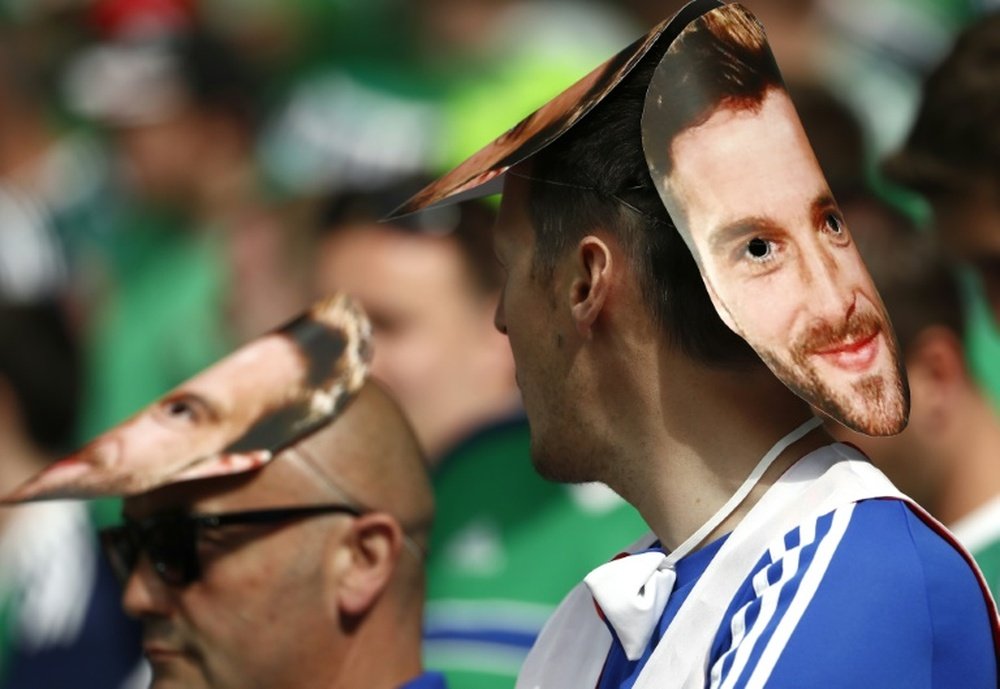 Northern Ireland fans with a mask of forward Will Grigg waiting for the start of their Euro 2016 Group C match against Ukraine, at the Parc Olympique Lyonnais stadium in Decines-Charpieu, near Lyon, on June 16, 2016