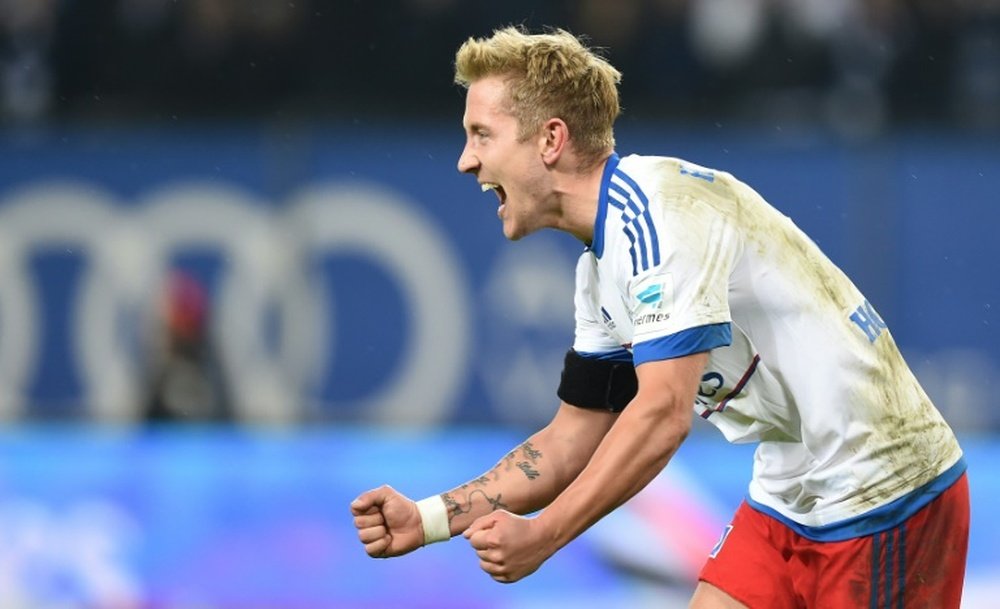 Hamburgs midfielder Lewis Holtby celebrates after a goal during the German first division football Bundesliga match between Hamburg SV and Borussia Dortmund in Hamburg, northern Germany on November 20, 2015