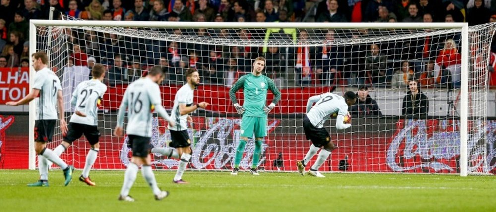 Belgiums players celebrate the equalizing goal of midfielder Yannick Carrasco (C) during an international friendly soccer match between The Netherlands and Belgium on November 9, 2016