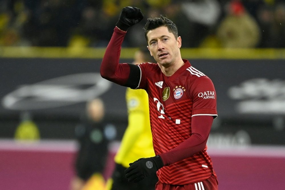 Robert Lewandowski scored twice for Bayern in a 3-2 win at Borussia Dortmund. AFP