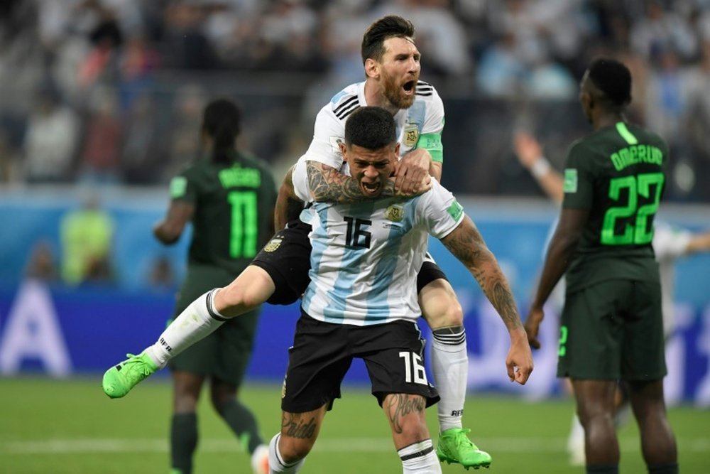 Messi y Rojo, héroes de Argentina. AFP