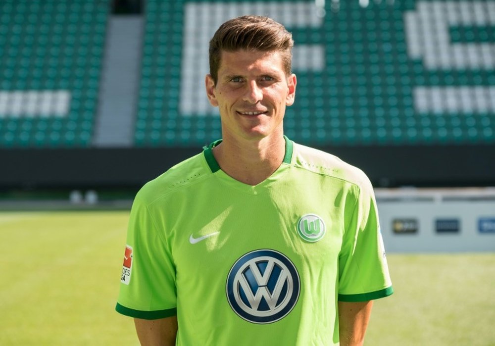 Mario Gomez will stay at Wolfsburg. AFP