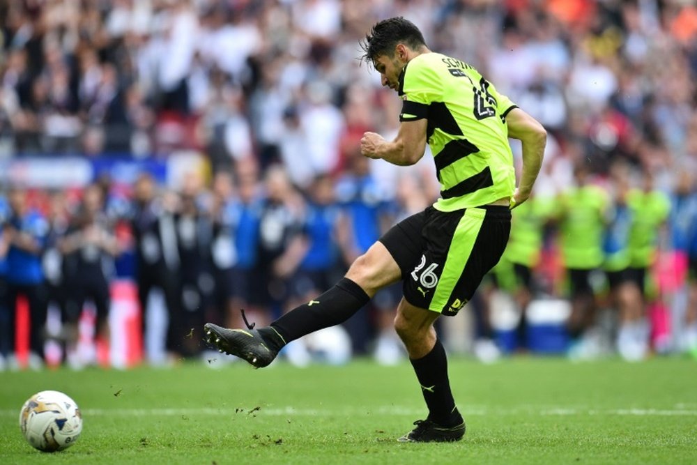 Huddersfield beat Reading on penalties in the Championship play-off final at Wembley in May. AFP