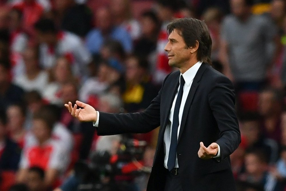 Antonio Conte watches from the touchline during his team's Premier League match against Arsenal. AFP