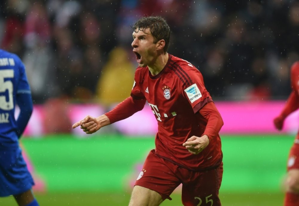 Bayern Munichs striker Thomas Mueller celebrates after the second goal for Munich during the German first division Bundesliga football match Bayern Munich and SV Darmstadt 98 in Munich, on February 20, 2016