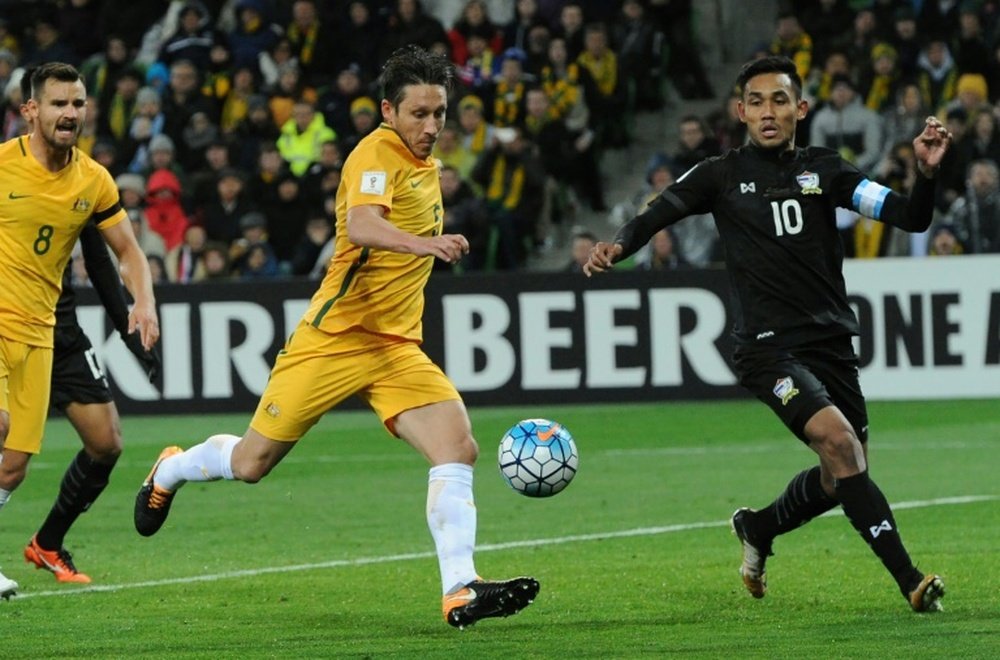 Australia edged past Thailand to keep their World Cup dreams alive. AFP