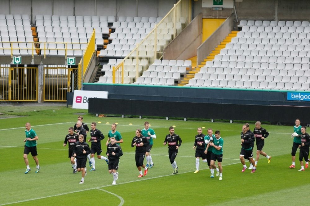 Wroclaws players warm up during a training session in Brugge, on August 7, 2013