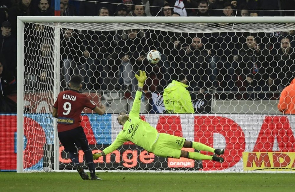 Lille's Yassine Benzia scoring against his former team. AFP