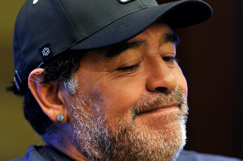 Argentine former football player Diego Maradona, pictured on April 9, 2015, was not able to leave Argentina on the weekend because his passport had been reported stolen, preventing him from travelling to Dubai, according to his lawyer