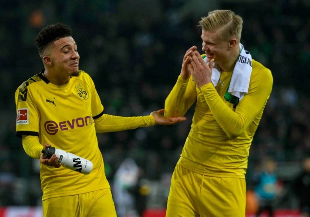 Jadon Sancho with teammate Erling Braut Haaland. AFP