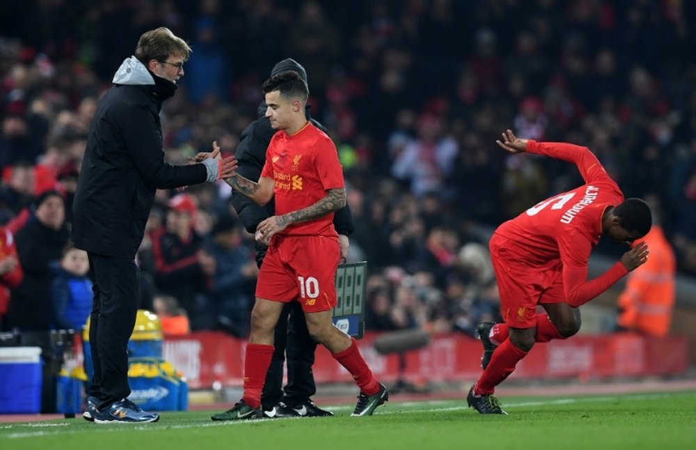 Wijnaldum wants Coutinho to remain at Anfield. AFP