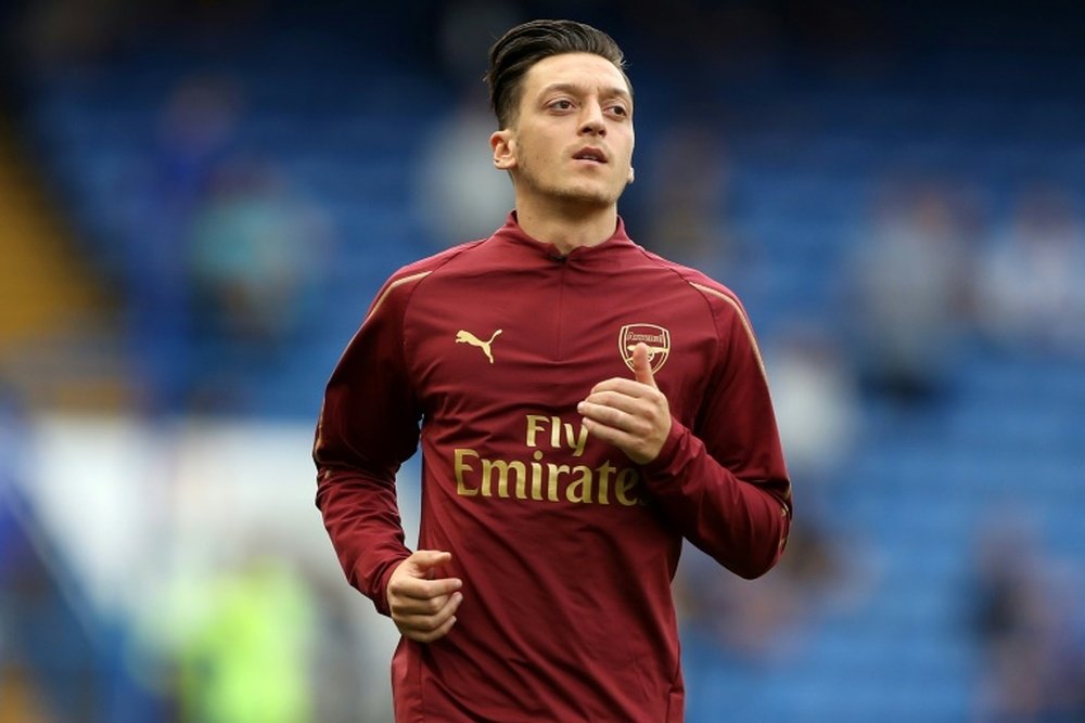 Mesut Ozil is swapping Arsenal for Fenerbahce.AFP