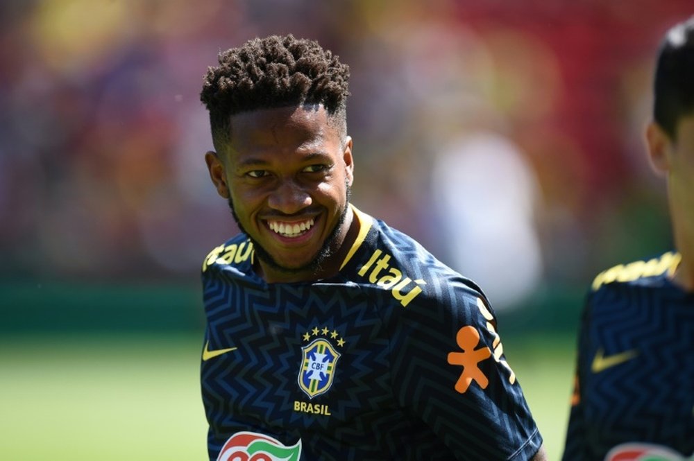 Fred sentiu dores no tornozelo e não seguiu treinando. AFP