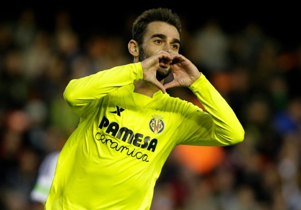 Villarreals forward Adrian Lopez celebrates his second goal during the Spanish league football match Valencia CF vs Villarreal CF at the Mestalla stadium in Valencia on May 1, 2016