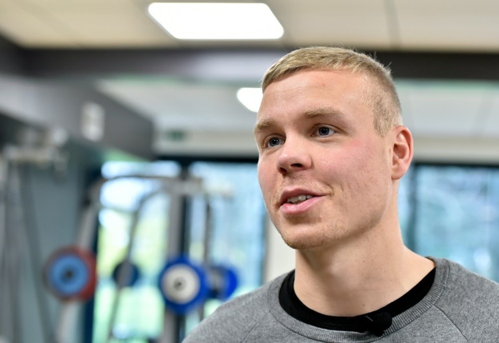 Icelands forward Kolbeinn Sigthorsson speaks with a journalist during a training session at FC Nantess football club training centre in La Chapelle-sur-Erdre, western France, on December 8, 2015